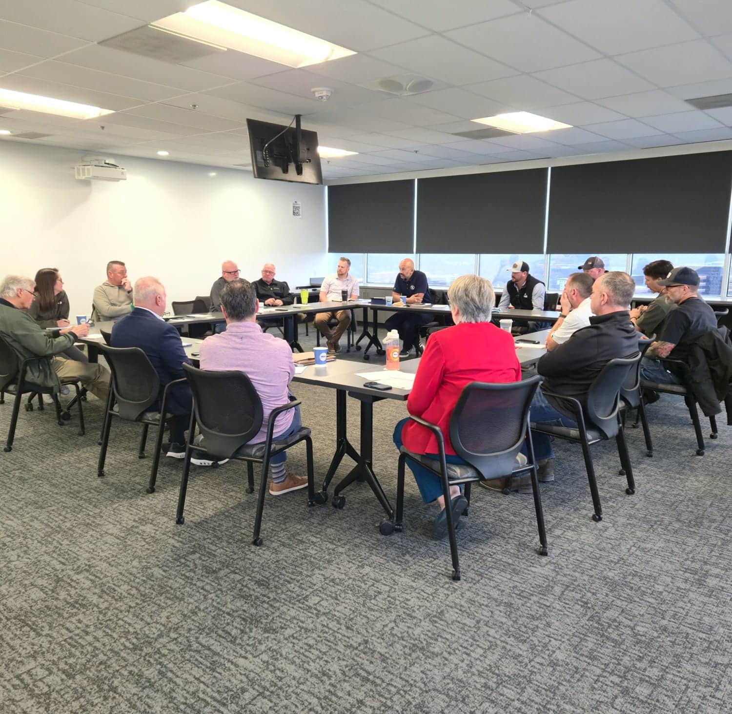 Signatory contractor representatives at a Business Manager Breakfast at the MCAKC office.