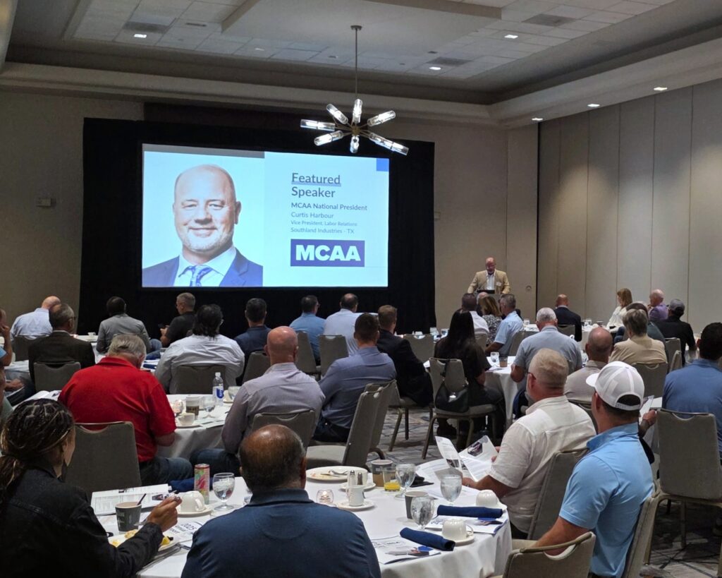 Curtis Harbour, MCAA President, presenting to attendees at MCAKC's Annual Membership Meeting.