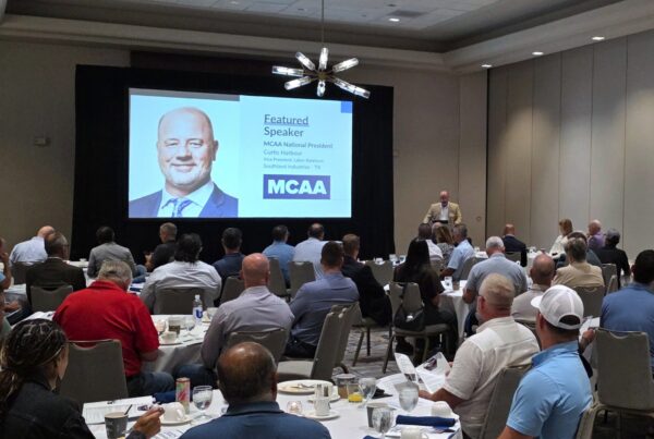 Curtis Harbour, MCAA President, presenting to attendees at MCAKC's Annual Membership Meeting.